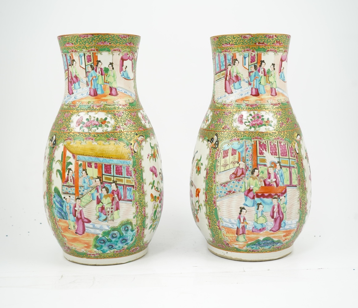 A pair of Chinese famille rose baluster vases, 19th century